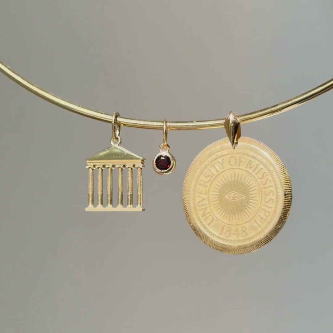 Ole Miss Lyceum Pendant shown on Neck Collar with Garnet Gemstone Charm and Ole Miss Eye Seal Large Florentine Pendant in gold