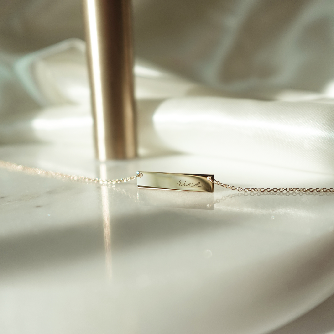 Rice Horizontal Bar Necklace shown in gold