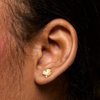 Large Gold Shamrock Stud Earring on Figure 