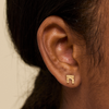 NYU Washington Arch Earrings on figure