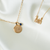 Villanova Sunburst Necklace shown in gold with Link Chain and Sapphire Gemstone laydown