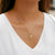 Gold Alpha Xi Delta Sunburst Crest Necklace on Model